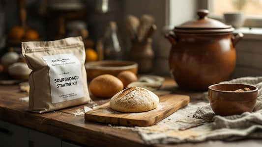 Sourdough starter jar with scattered flour on wooden surface with warm natural window light — sourdough starter kit with dutch oven guide from Mother's Country Store