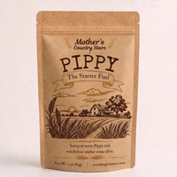 A kraft paper stand-up pouch labeled 'Mother's Country Store Pippy The Starter Fuel' with a brown illustrated farm scene on the front, photographed against a plain light background.